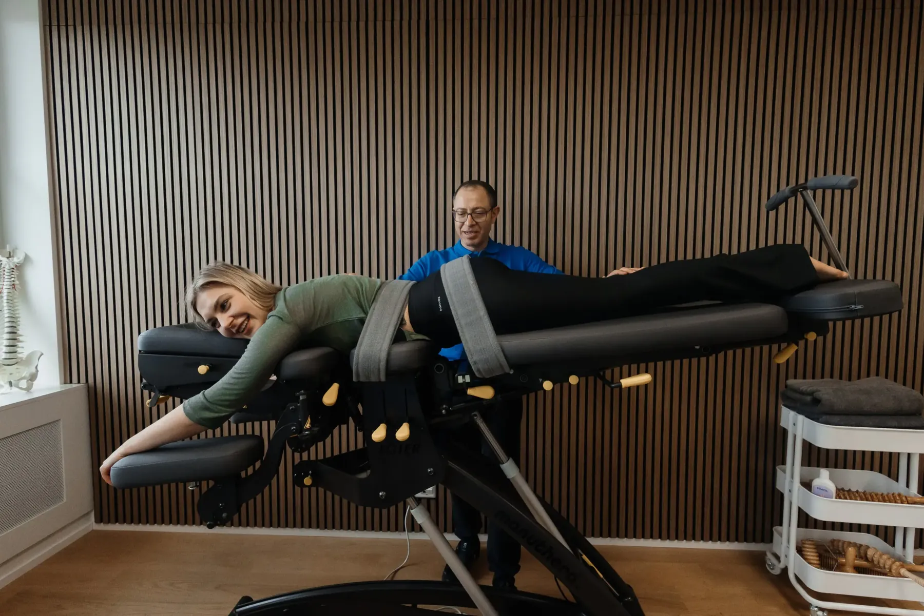 Medhat Khalil treating a patient on the decompression chair